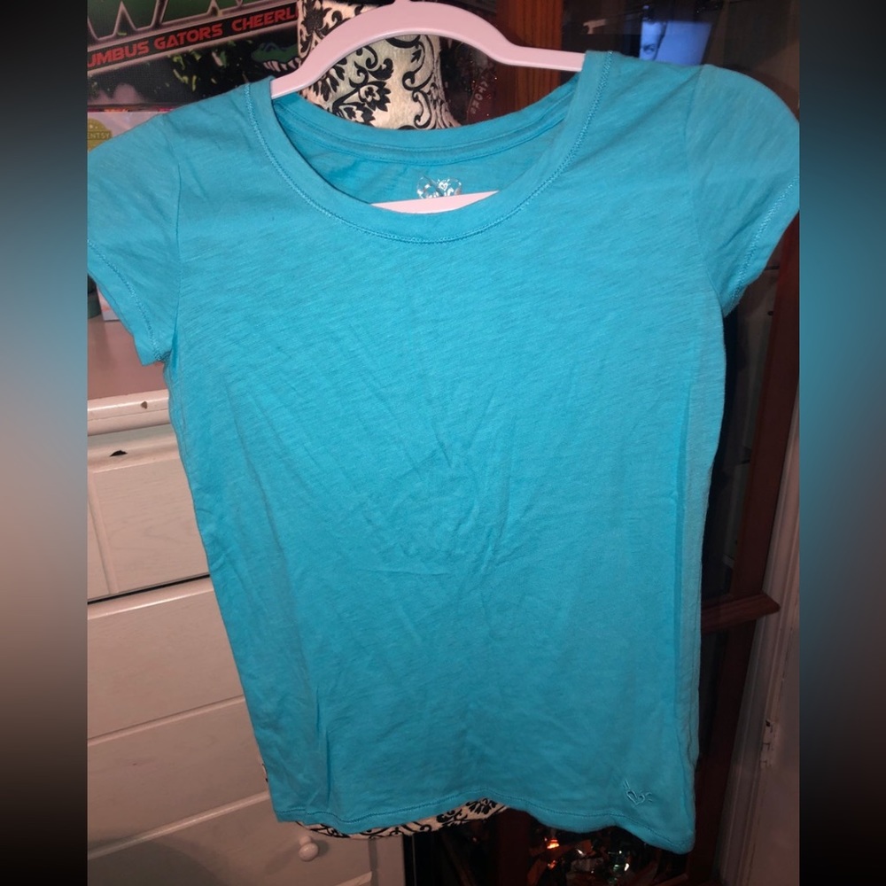 Blue Justice shirt size 12‎